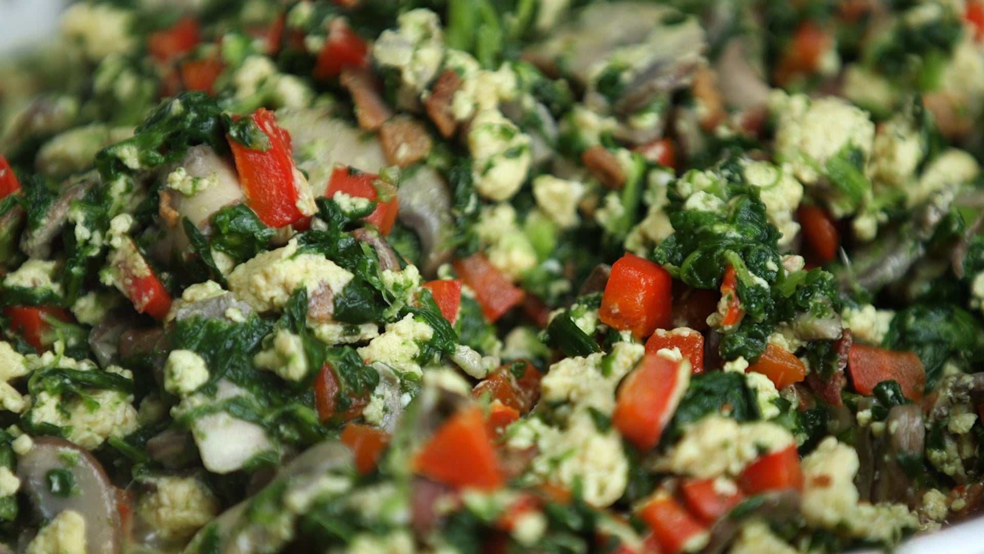 Spinach and egg salad in a bowl